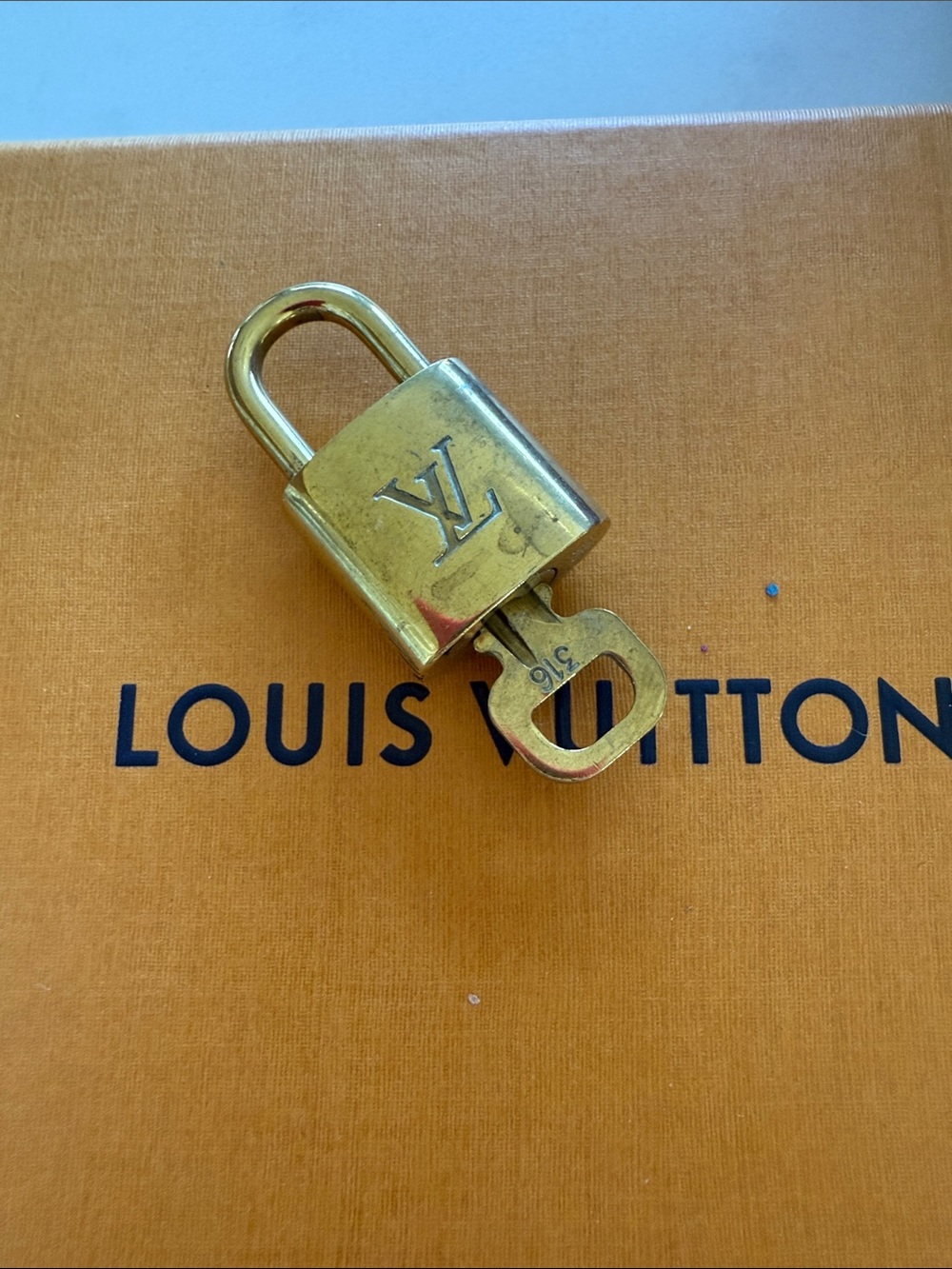 Louis Vuitton lock and key 316